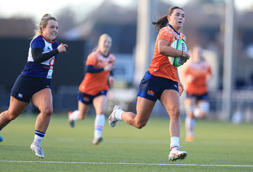 Edinburgh's Emma Orr scores a try during a Celtic Challenge match between Edinburgh Rugby Women and Wolfhounds at Hive Stadium, 2024.