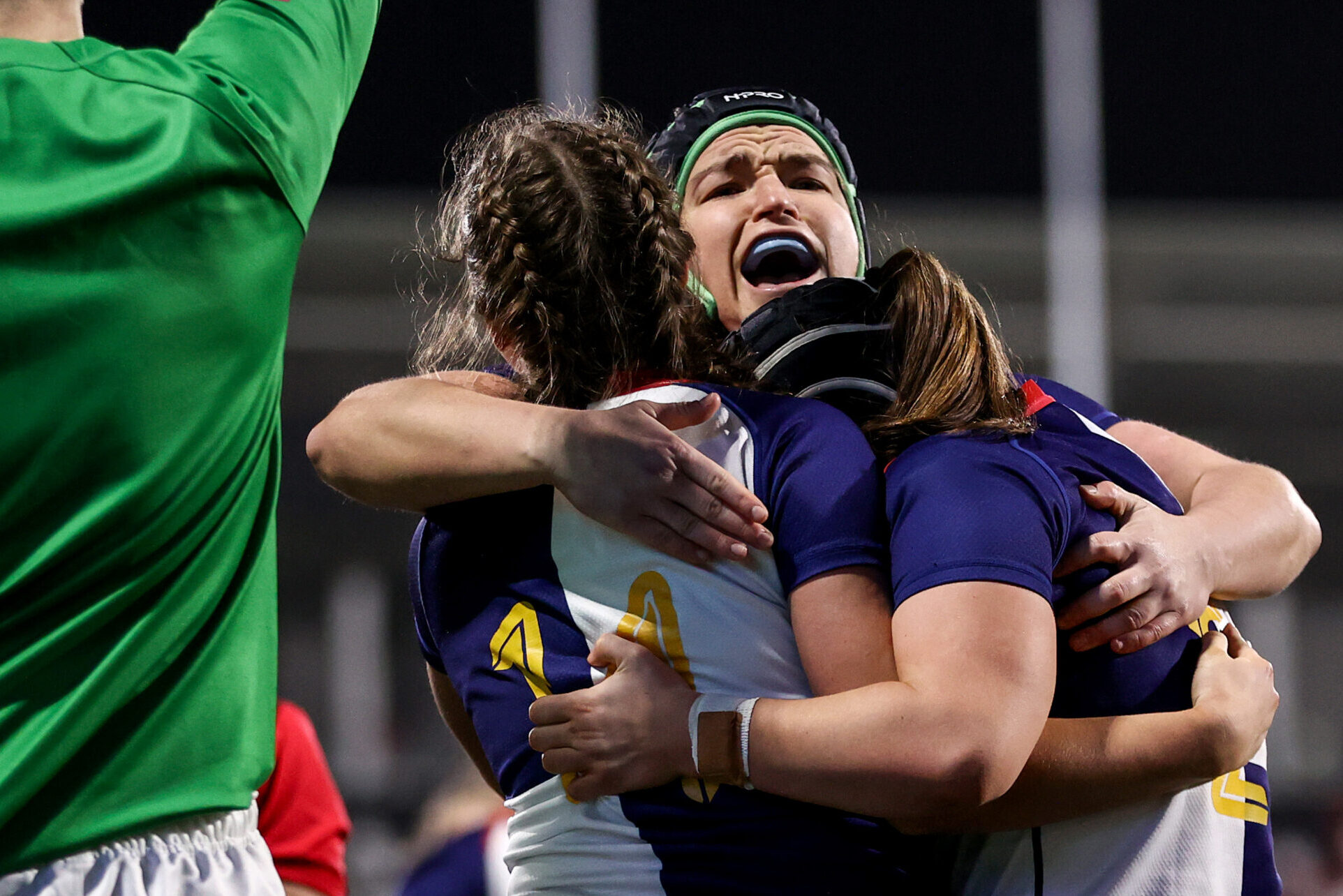 Wolfhounds' Katie Corrigan celebrates after scoring her teams fourth try with Christy Haney, 2024.